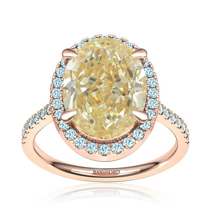 Oval Yellow Diamond Halo Ring